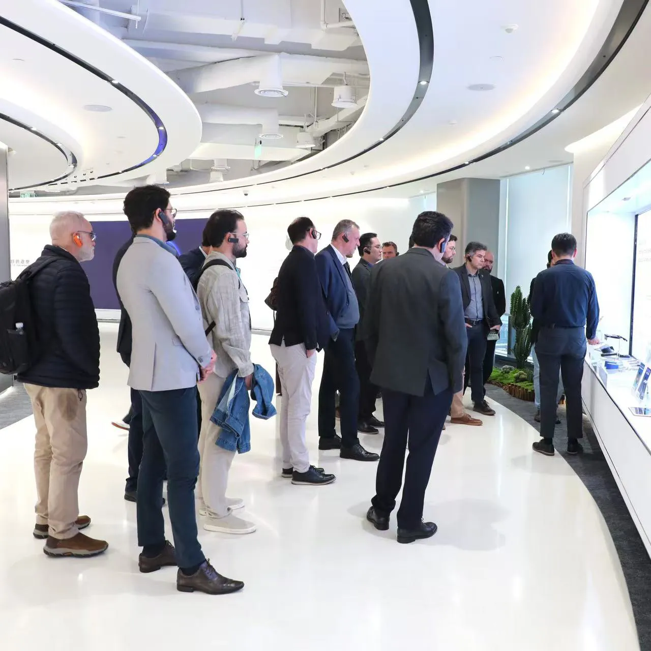 International visitors experiencing Chinese robotics technology